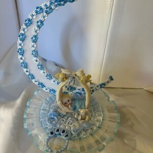 Blue and White Baby Figurine with Moon and Teddy Bear